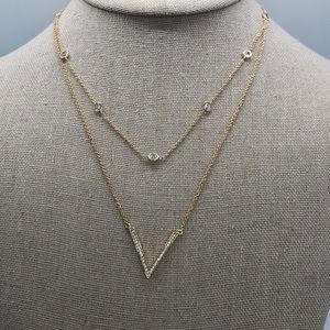 Elegant Gold plated CZ double chain necklace .
